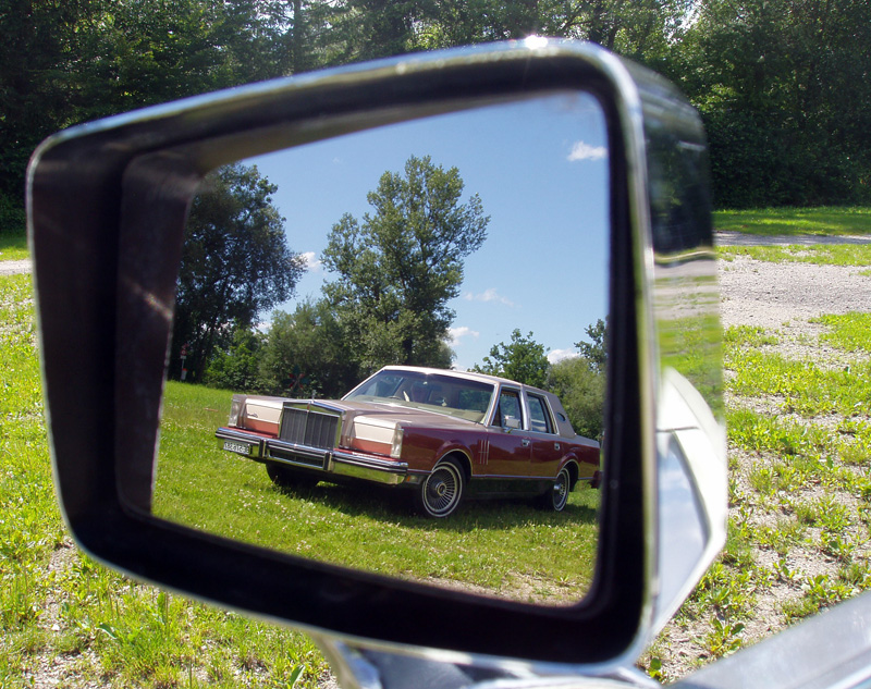 Continental Mark VI in Mark V's outside mirror